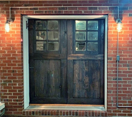 What height should sconces be next to door?