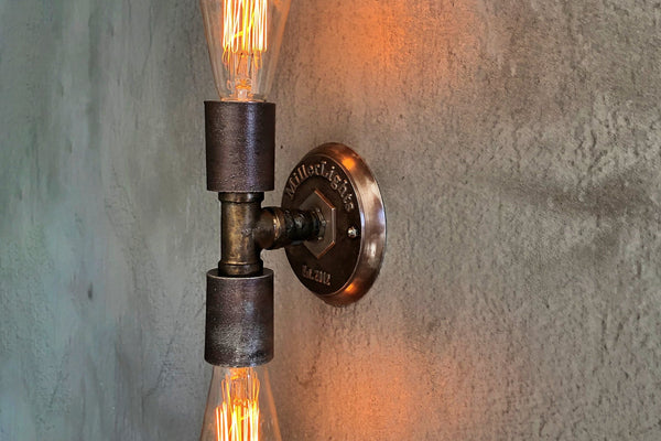 Should sconce lighting be up or down?