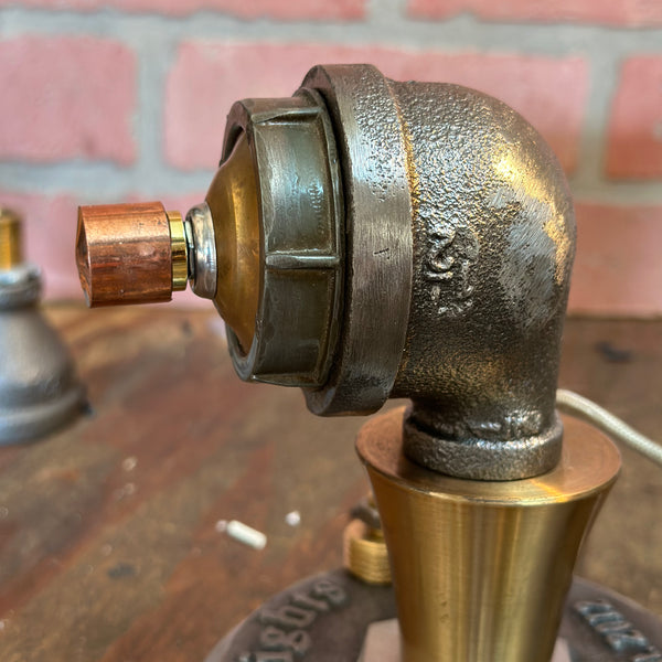 Detailed side profile of Steampunk Pipe Lamp Dimmer Module with cast iron elbow joint and copper control knob for lighting adjustment.