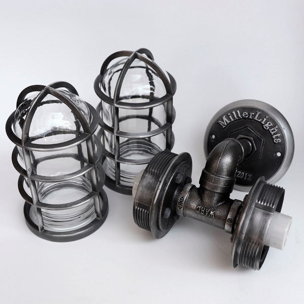 Vintage aesthetic iron pipe wall light with double glass globes and two bulbs