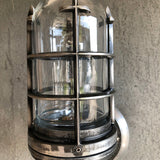 crown style metal framed wall light