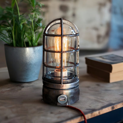 industrial cage lamp with steampunk usb on rustic table top millerlights