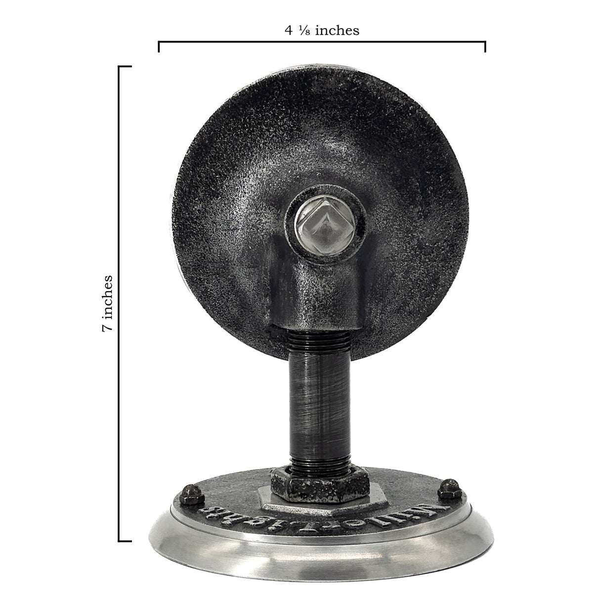 Extending from the wall mount, a short black metal arm supports the socket assembly, which has a weathered, industrial finish.