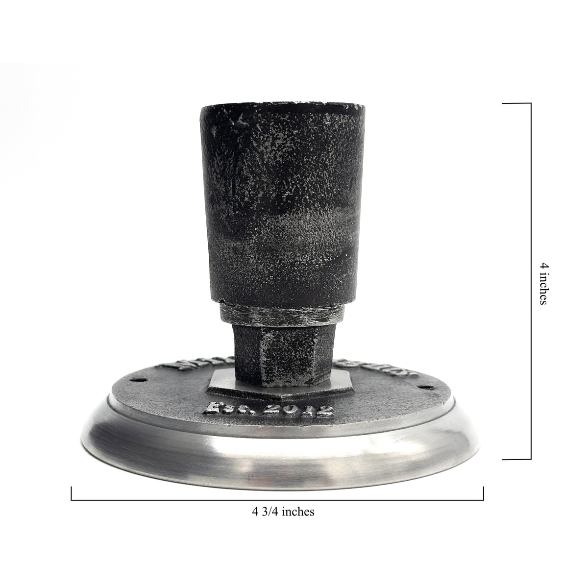Exposed Edison bulb in a vintage industrial ceiling mount.