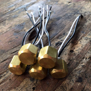lot of lamp switches made with brass knobs 