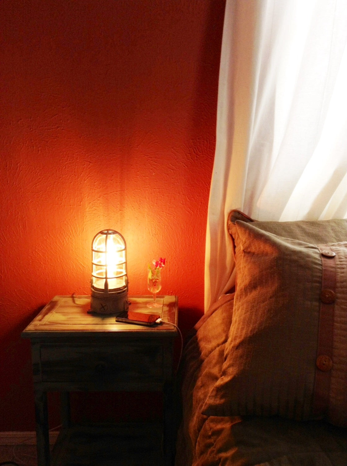 bedside lamp industrial metal cage on bedroom nightstand
