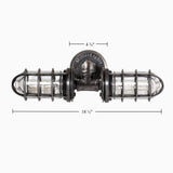 MillerLights industrial antiqued steel conduit wall sconce featuring a double horizontal iron pipe design with protective metal wire cages and clear glass jars over vintage Edison bulbs.